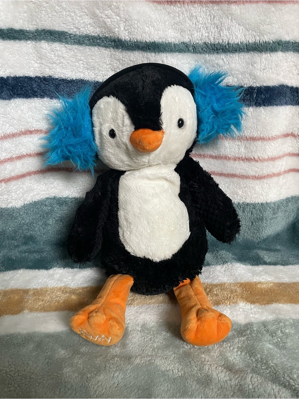 Retired Scentsy Buddy Penguin Plush with Blue Ear Muffs